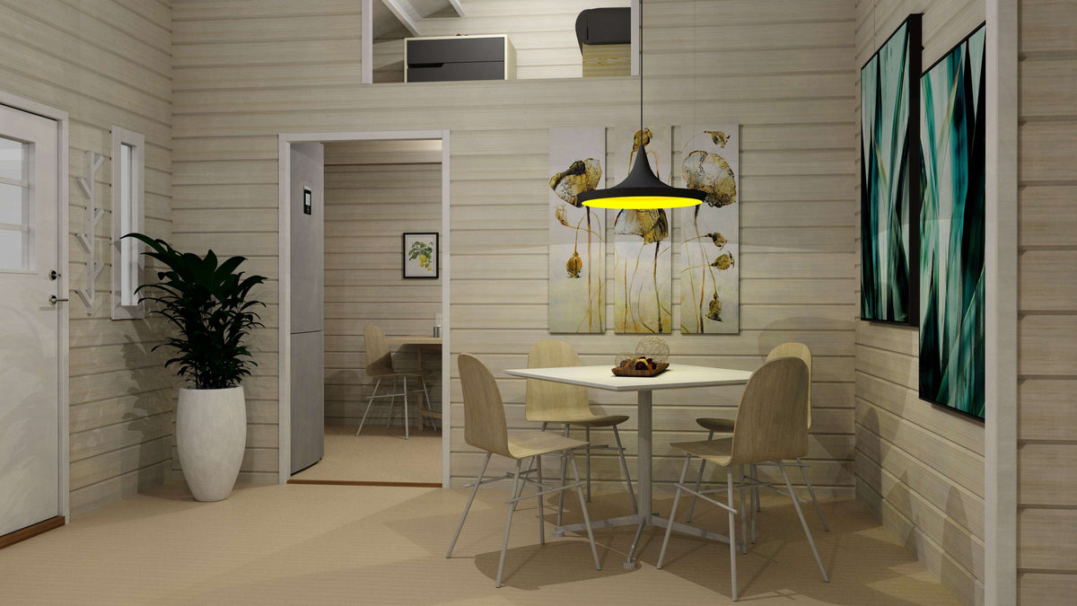Attefallshus Lövskär Loft Torp 30 kvm, matplats med bord, stolar och taklampa.